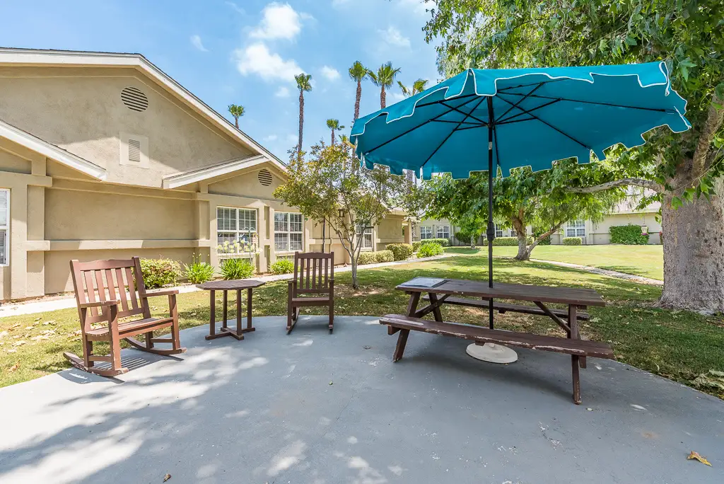 Picnic Table with Umbrella and Rocking Chairs Picnic Table with Umbrella and Rocking Chairs